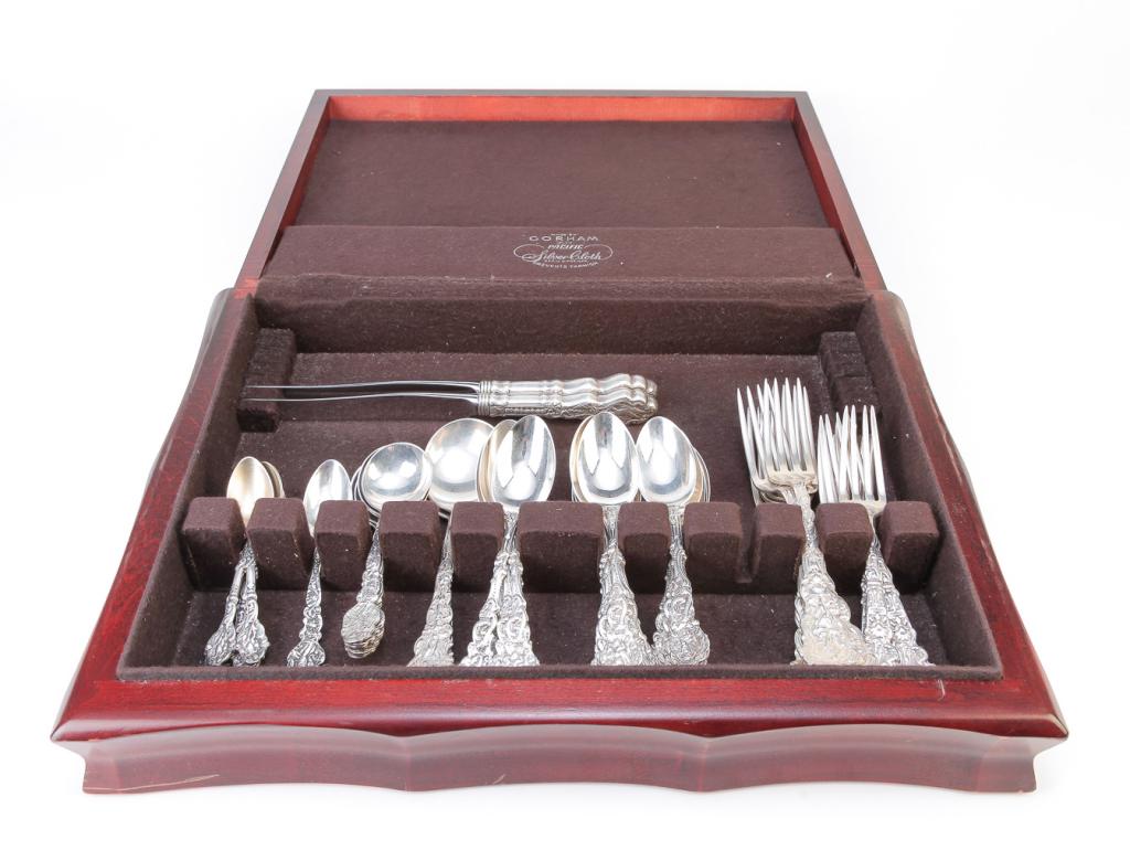 PARTIAL SET OF GORHAM VERSAILLES STERLING FLATWARE: American, patented 1888. Six dinner forks, five salad forks, twenty six teaspoons, two soup spoons, six each boullion and demitasse spoons (latter with vermeil bowls), small spoon and two hollow handl