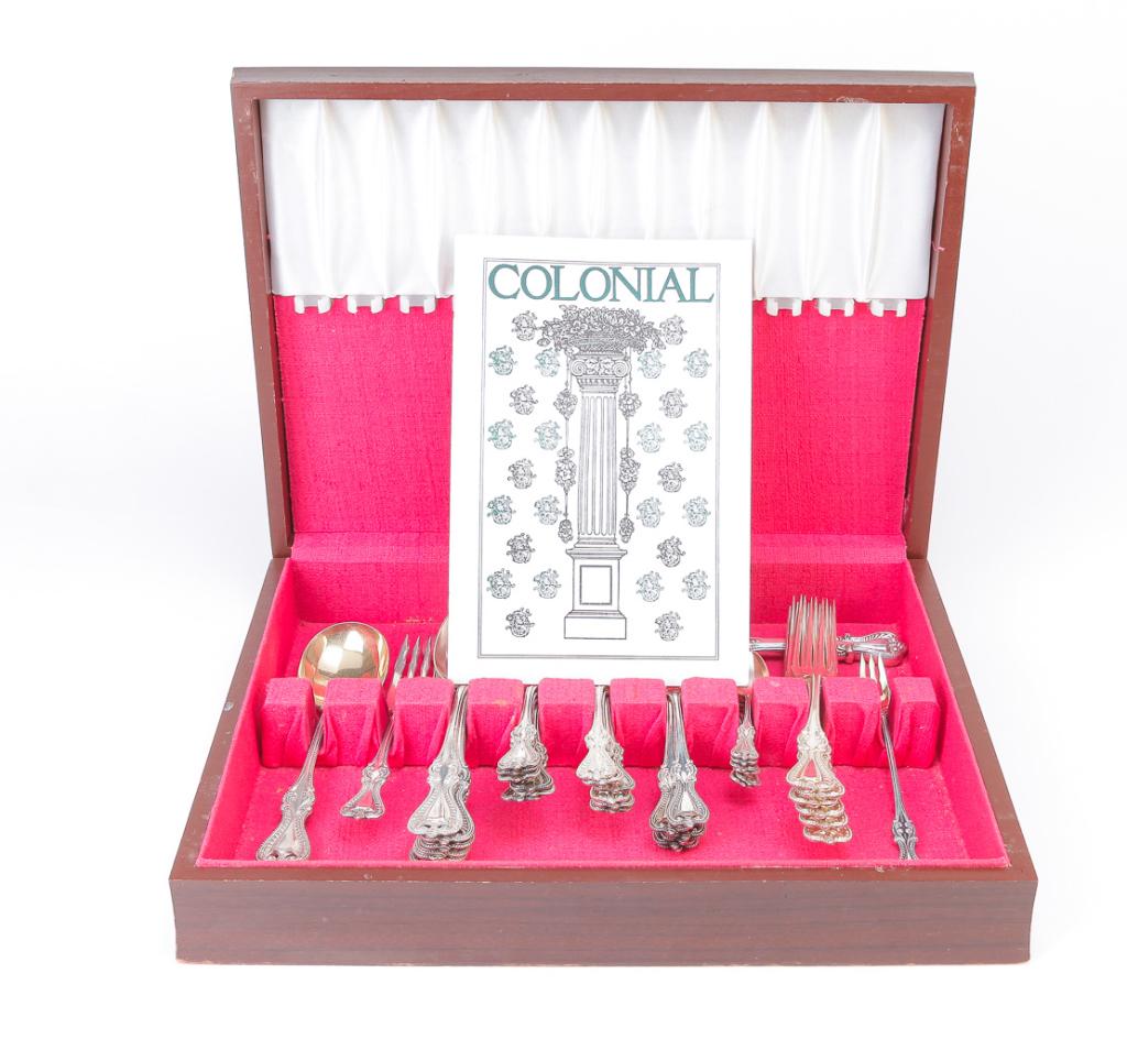 FORTY PIECES OF TOWLE OLD COLONIAL STERLING.: American, patented 1895. Flatware. Six each soup spoons, forks and demitasse spoons with vermeil bowls, eighteen teaspoons, salad fork, pickle fork, soup spoon with round vermeil bowl and a hollow han