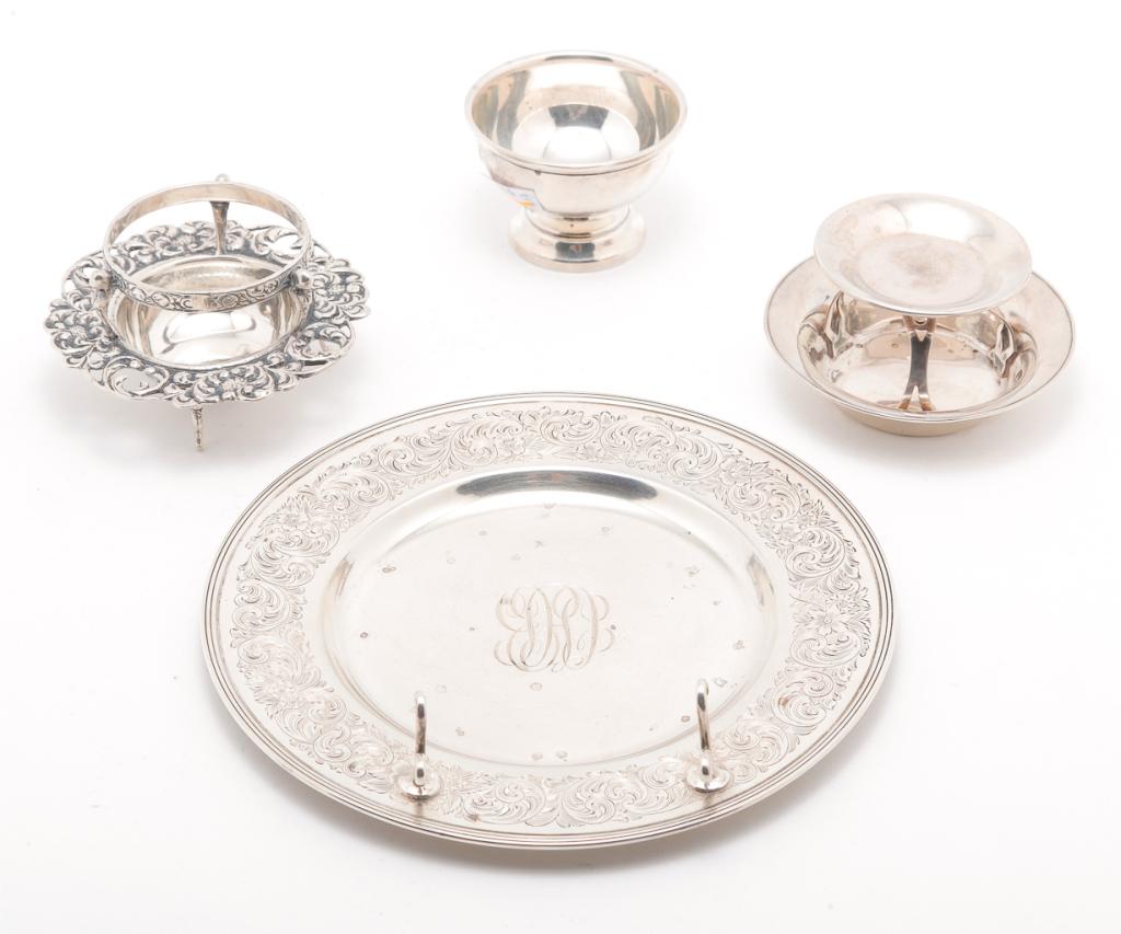 FIVE PIECES OF SILVER AND SILVERPLATE.: Twentieth century. Gorham sterling plate with knife rest, 6.25"d., sterling burner support (?) by Webster and another with Continental hallmarks, miniature sterling footed bowl, 1.5"h. with unmarked u