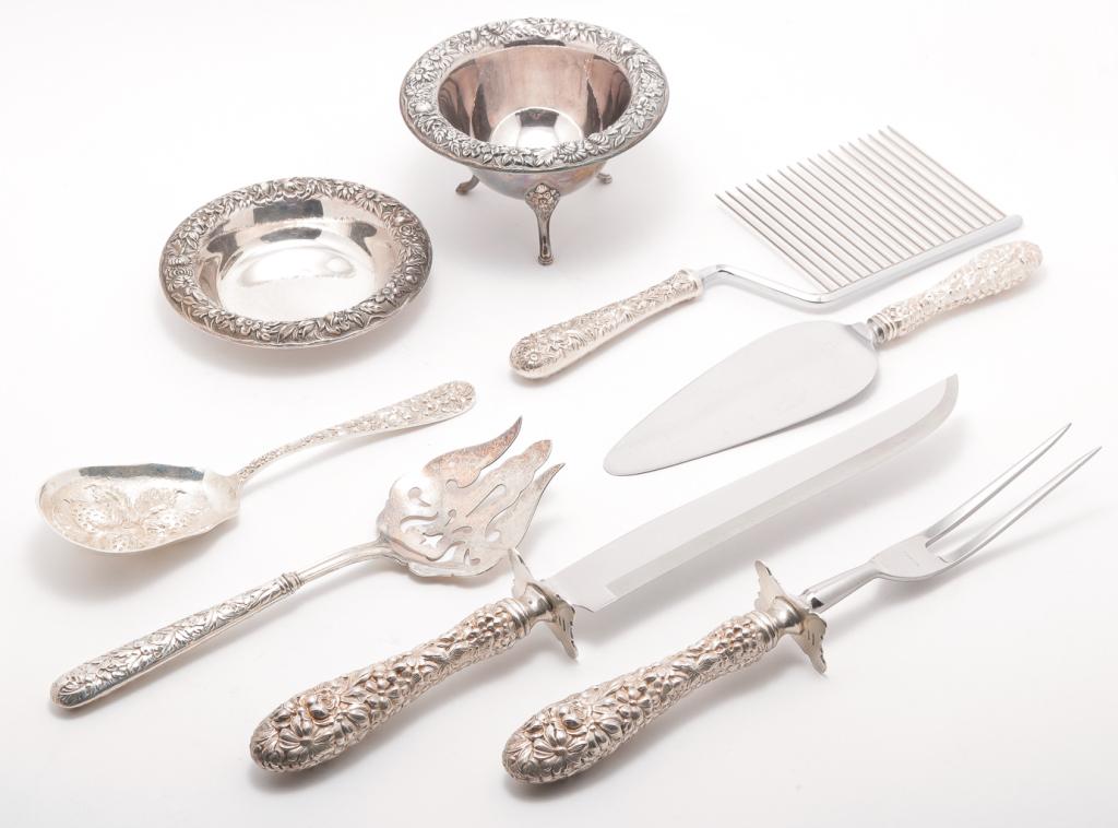 EIGHT AMERICAN STERLING PIECES.: Twentieth century. Three repousse pattern by "S. Kirk & Sons". Bowl, 3"h. 5"d., dish, 5"d. and a cake cutter, 10.5"l. Together with five similar serving pieces. "Stieff" carving fork and knife, cake s