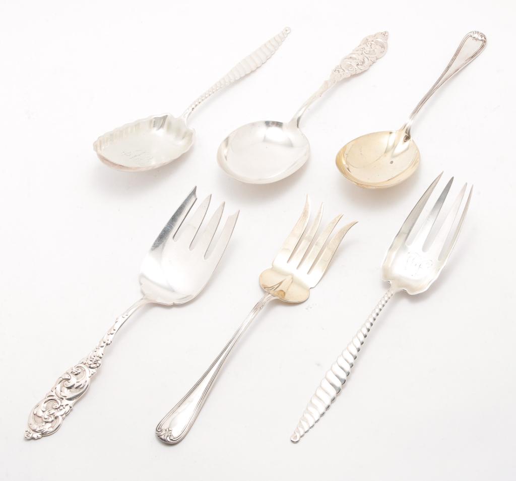 THREE PAIRS OF "STERLING" SALAD SERVERS.: American, late 19th-20th century. Matching salad forks and spoons. Marked for Whiting Mfg. Co. with monogram, 9.25"l., unknown "A", 9"l. and unknown "G" with "Hansel, Sloan & Co." mark and vermeil sur