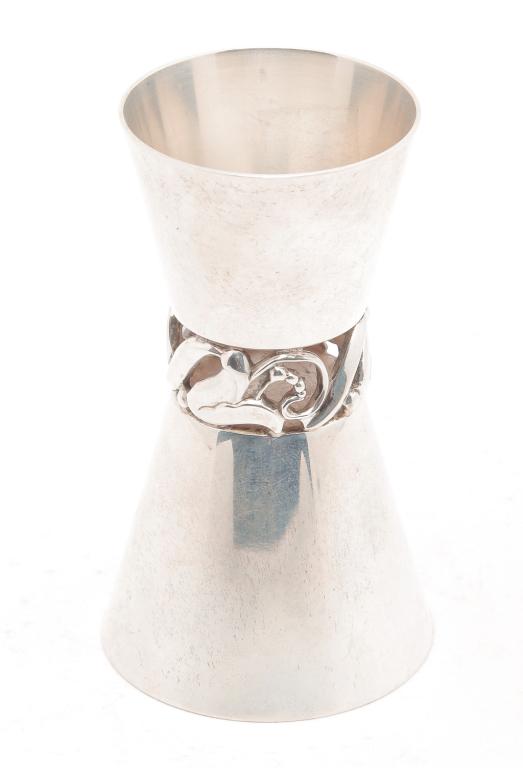 INTERNATIONAL SILVER PAGLIA JIGGER.: Mid 20th century. Marked "International Sterling La Paglia Designed". Alphonse La Paglia worked for Georg Jensen USA before going to International in 1952. 3.5"h. Approx. 2.7 ozt.