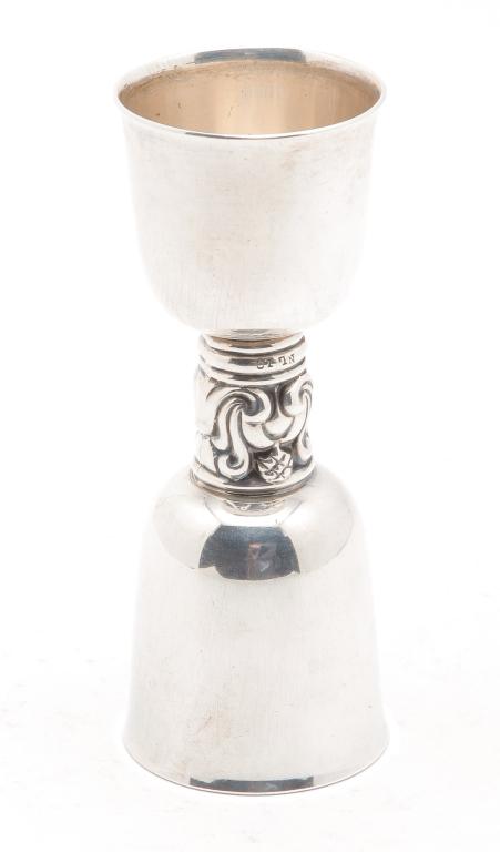 INTERNATIONAL SILVER ROYAL DANISH JIGGER.: Mid 20th century. Royal Danish pattern, marked "Sterling, NL 19". 4.25"h. Approx. 2.1 ozt.
