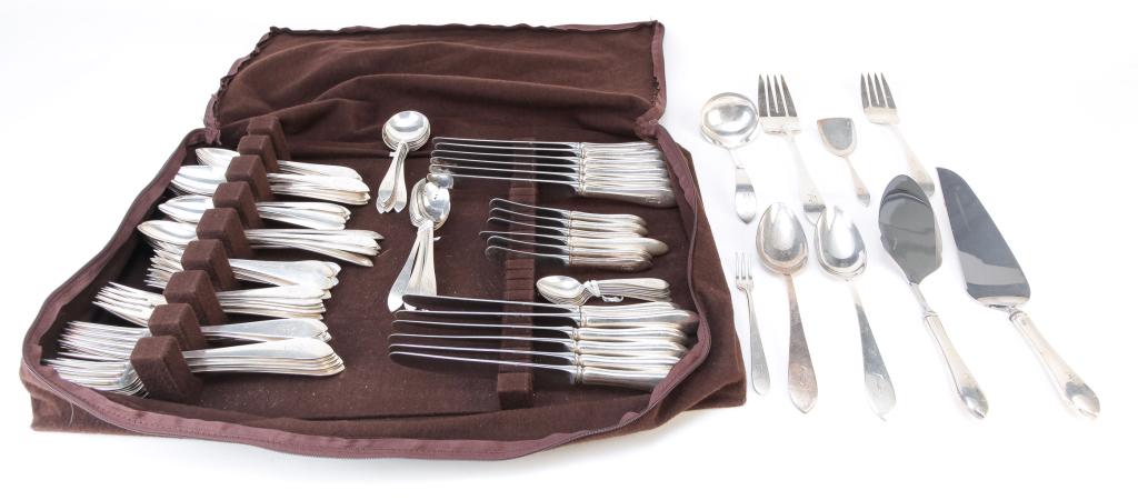 SET OF AMERICAN STERLING FLATWARE.: Early 20th century. Knife blades are marked "Reed & Barton Mirrorstele Sterling Handle", other pieces marked "Sterling". One hundred and one pieces including six each luncheon knives, butter knives, f