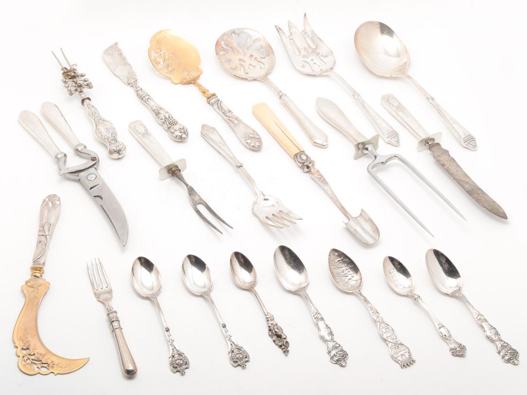 SILVER FLATWARE INCLUDING CARVNG SET.: Twentieth century. Seven "sterling" spoons including "November" and 1892 Columbian Exposition. Approx. 5 ozt. and a cheese scoop with composition handle, unmarked. 10"l. Together with a group of hollo