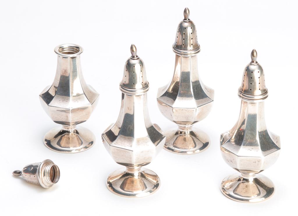 FOUR AMERICAN "STERLING" SALT AND PEPPER SHAKERS.: First half 20th century. Differing marks for "Fisher". Varying small dents, one cross threaded. 5.25"h. Approx. 9 ozt.