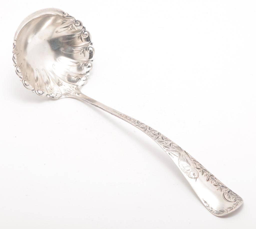 AMERICAN "STERLING" BRIGHTWORK LADLE.: Late 19th century. Gorham ladle with engraved songbird. 12.5"l. Approx. 3.8 ozt.