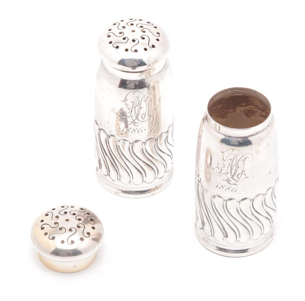 PAIR OF "STERLING" SALT AND PEPPER SHAKERS.: Late 19th century. Marked for Gorham, monogrammed and dated 1886. 3"h. Approx. 2.6 ozt.