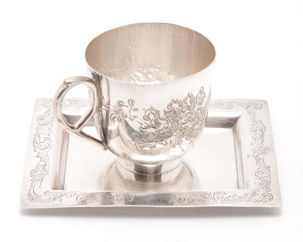 TWO PIECES OF CHINESE EXPORT SILVER.: Late 19th-early 20th century. Both with unknown hallmarks and engraved designs. Cup with bird and flowers, 2.25"h. And a small square tray. Dents. 3.75" x 4.5".