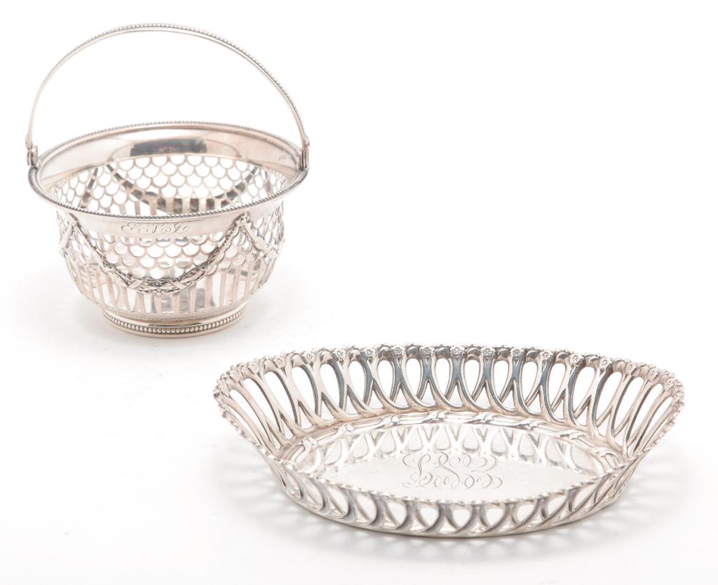 AMERICAN "STERLING" BASKET AND TRAY.: Twentieth century. Both marked and monogrammed. Reticulated basket with swing handle by Gorham. 3"h. including handle. And a reticulated oval tray by Whiting. 4" x 5.25". Approx. 4.5 ozt. total.