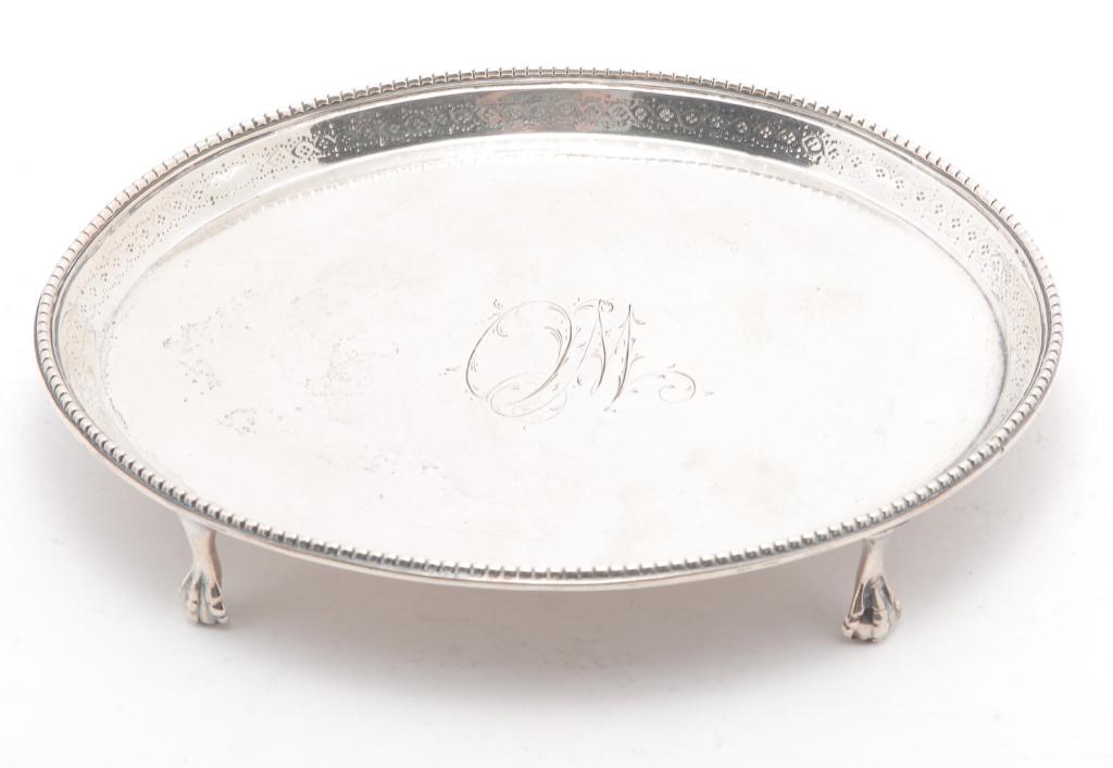 ENGLISH SILVER SALVER.: London hallmarks for 1799. Maker's mark gothic letters "SW". Oval with beaded edge and pawfeet. Monogrammed, some repair at feet. 4.75" x 6". Approx. 3.5 ozt.