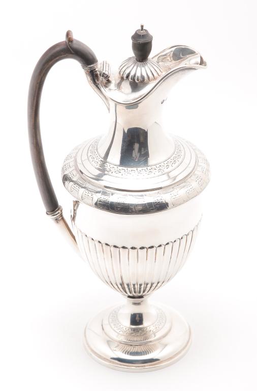 ENGLISH SILVER TALL POT.: London hallmarks for 1889, maker Barnard and Sons. Delicate vine chasing, and ribbed body. Ebonized wood handle and finial. 10.5"h.