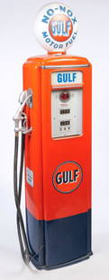 AMERICAN "GULF OIL" GAS PUMP.: Mid 20th century. Restored "Tokheim" base and reproduction milk glass globe. 94"h. 30"w. 19"d.