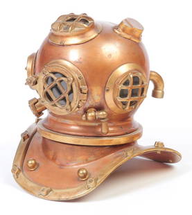 BRONZE DIVER'S HELMET MODEL.: American, 2nd half 20th century. Brass trim and glass lenses. Dent in top. 10.5"h.