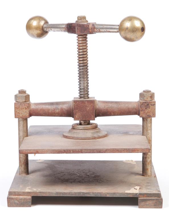 BOOK OR SPECIMAN PRESS.: Probably American, late 19th-early 20th century. Cast iron plates with threaded handle with brass ends. Wear. 16"h. 12.5" x 12.5".