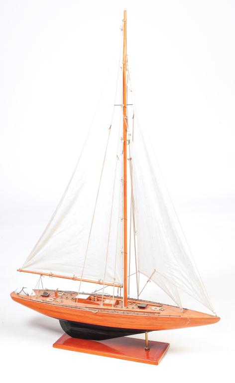CHINESE POND SAILER.: Late 20th century, basswood and pine. Canvas sails. 51"h. 35"l. 7"w.