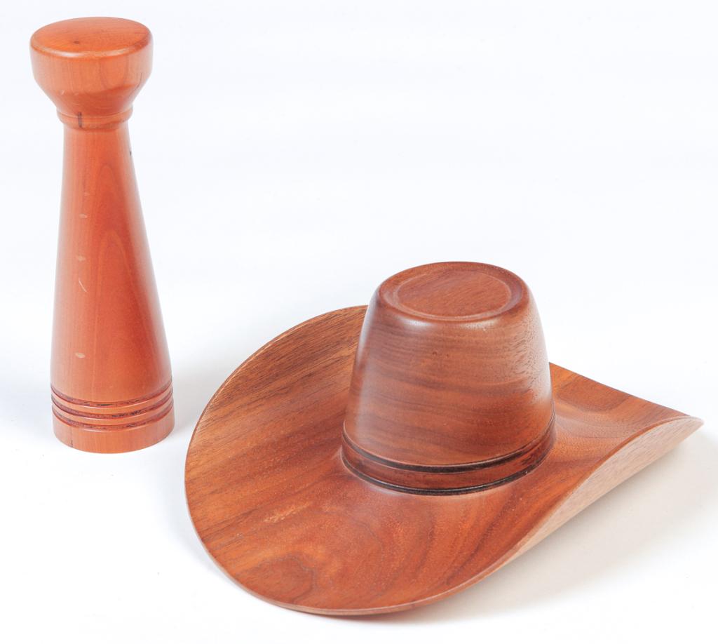 AMERICAN WOOD CARVING OF COWBOY HAT AND STAND.: Hat signed "Jerry Smith, Elkview, WV, walnut". Thinly made hat on turned stand. 6.5"h. 8"w. overall.