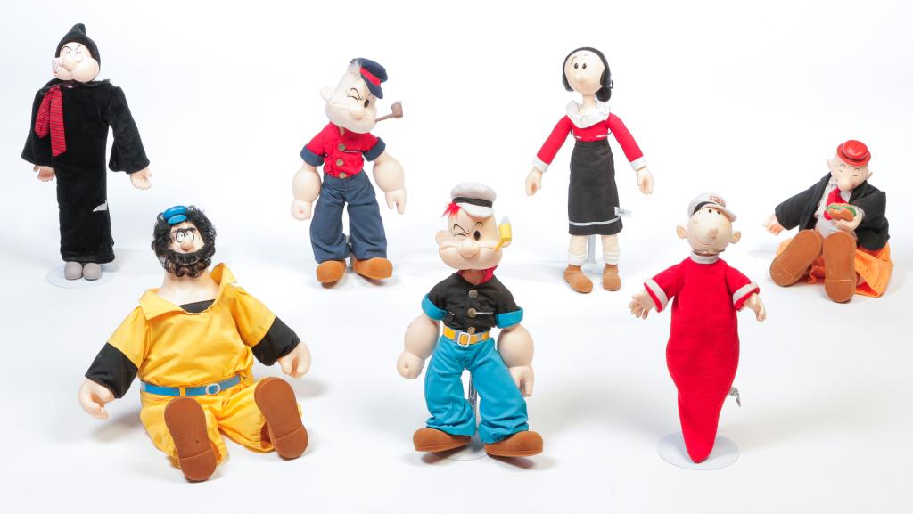 SEVEN POPEYE CHARACTER DOLLS.: Made in Korea for "Presents". Popeye, 18"h., Bluto, 23"h., Olive Oyl, 19"h, Wimpy, 17"h., Sweet Pea, 16"h., Poopdeck Puppy, 17"h. And Sea Hag, 21"h.