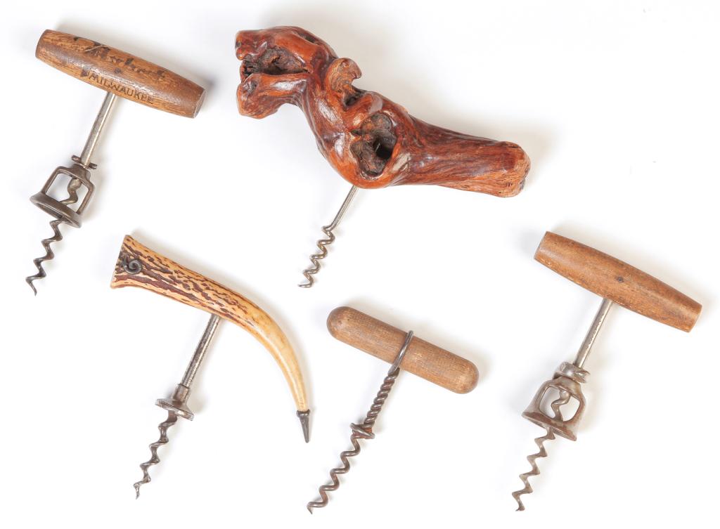 FIVE ASSORTED CORKSCREWS.: Twentieth century. Three wood handles, one root handle and one antler. Some wear.