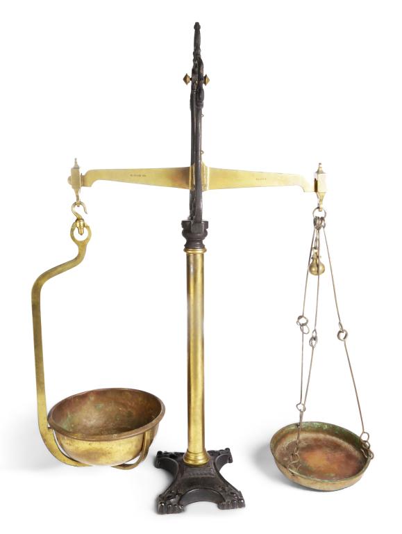 SET OF WHITE AND SONS BALANCE SCALES.: Auchtermuchty, Scotland. 4th quarter 19th century. Brass and cast iron with die stamped makers mark on balance beam and reverse. "To weigh 8 lbs. Class B." 32"h. 24"w.