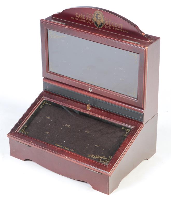 AMERICAN "CASE" KNIFE STORE DISPLAY CASE.: Second half 20th century, mahogany and veneered woods. Multiple labels including crest "Case XX Select Pocket Cutlery, Braford, Pa.". 24"h. 19.75"w. 13.75"d.