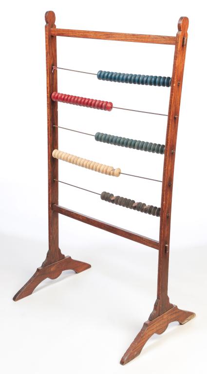 AMERICAN BILLIARDS SCORE KEEPER.: Ca. 1900, oak frame. Painted wooden beads in five rows. Some warping and damage to beads. 60.5"h. 32.5"w. 23.5"d.
