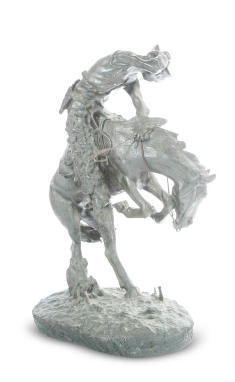 BRONZE "RATTLESNAKE" AFTER FREDERICK REMINGTON.: Second half-20th century, signed on the base. Rearing horse and rider. Green marble base. 24"h. 28"l.