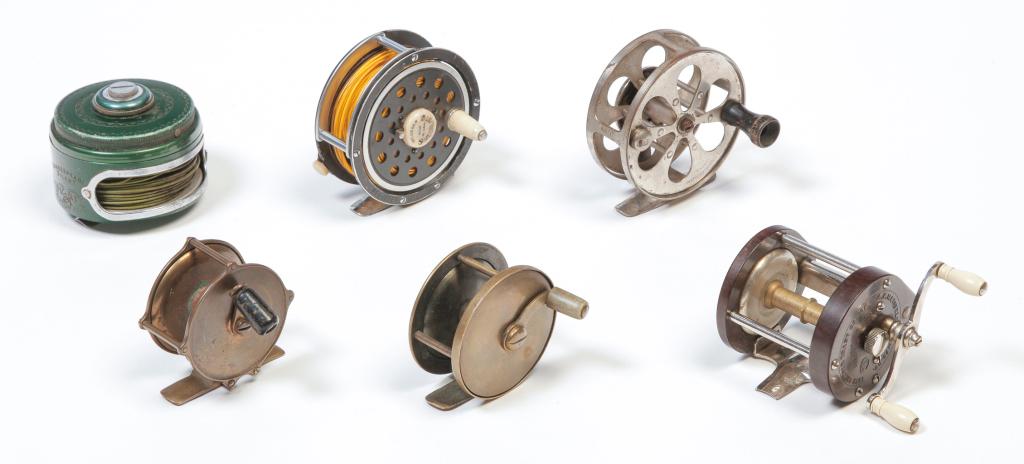SIX AMERICAN FLY ROD REELS.: Twentieth century. Meisselbah model 100 Bullseye and model 17, Pflueger Medalist 1494 1/2, Shakespeare Silent, together with two brass pillar. 2.5"d.