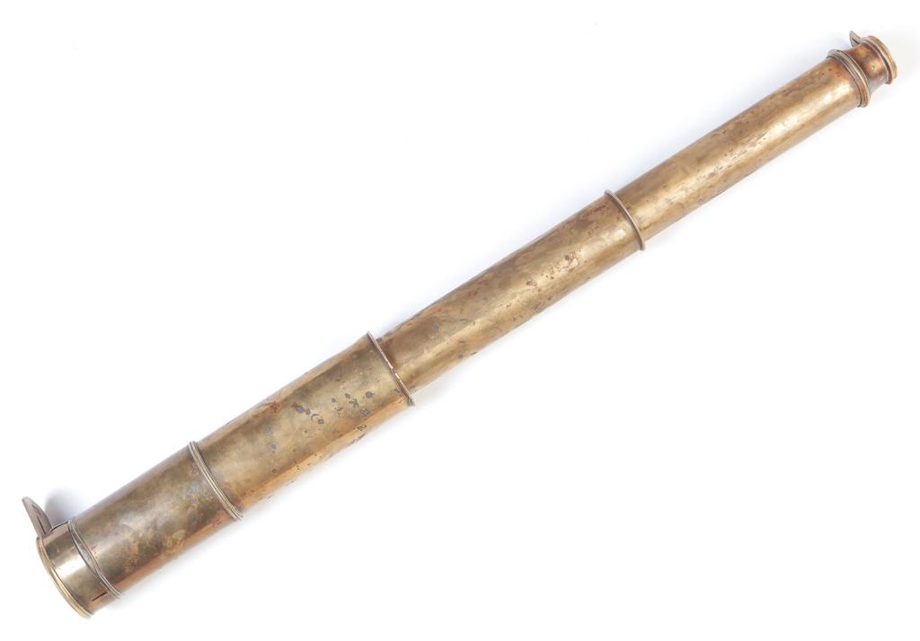 BRASS TELESCOPE.: American or European, 2nd half 19th century. Collapsible telescope with lens covers. Wear and dents. Front lens cover removable. 12"l.