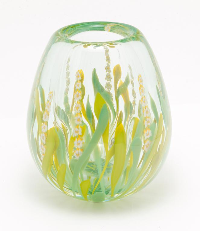 AMERICAN MARK PEISER ART GLASS VASE.: Fourth quarter 20th century. Artist signed and dated "1976" and "PIN008" (?). Tear drop shape with stalks of flowers and foliage with one single bloom placed low on side. 6.25"h.