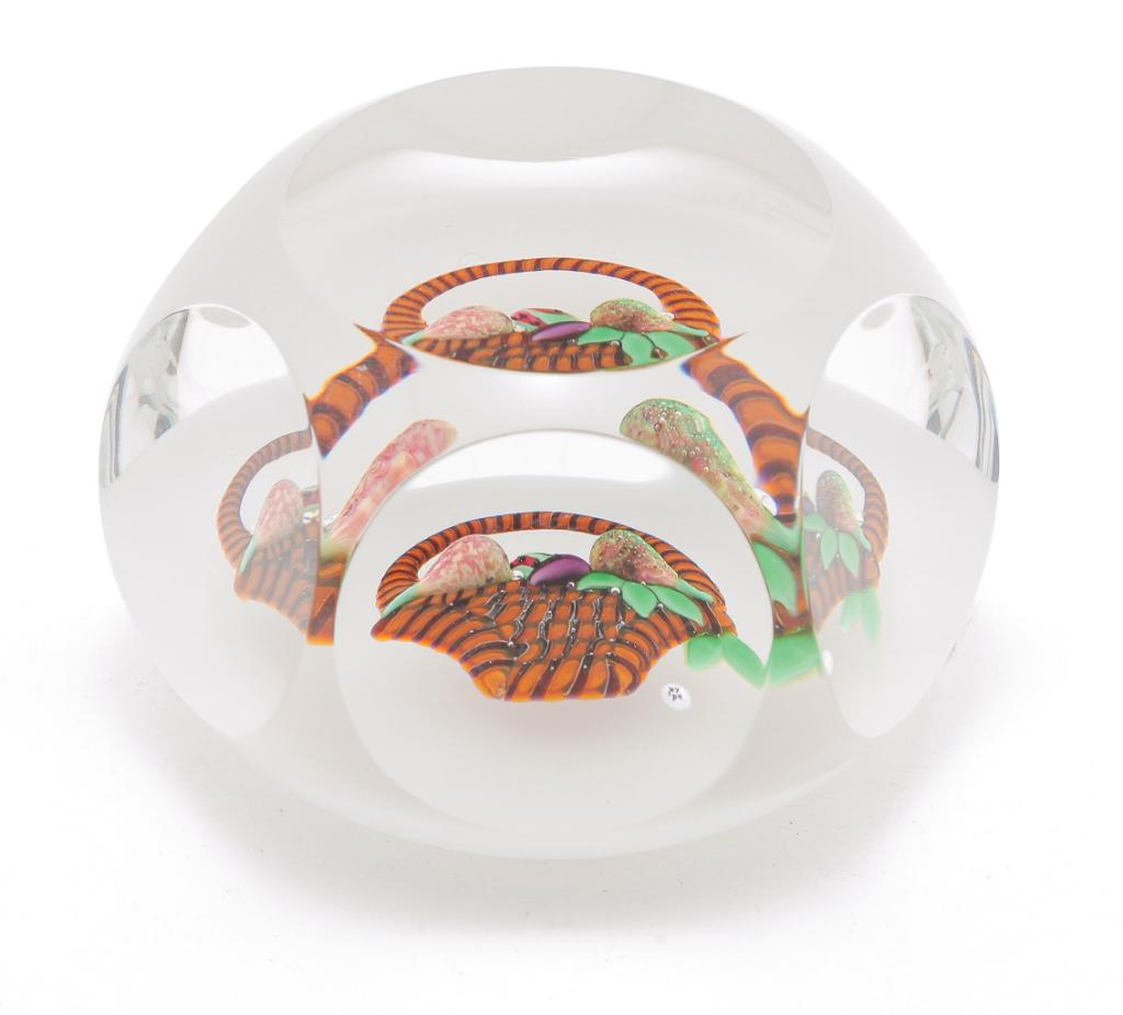 FRENCH BACCARAT PAPERWEIGHT.: Third quarter 20th century. Base has acid etched "Baccarat"mark and "300, 1976". Concave round cut top and sides, opalene background, basket of fruit and date cane "1976 B". 3"d.