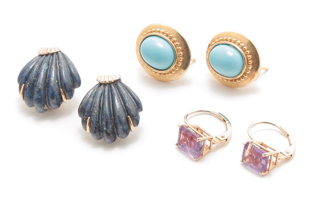 THREE PAIRS OF GEM SET YELLOW GOLD EARRINGS.: American, late 20th century. Three pairs of 14K gold earrings to include: carved lapis in a shell motif, omega non-pierced backs, .75"h; lever back drop earrings, each with faceted emerald cut amethys