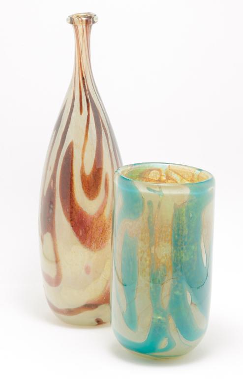 TWO PIECES OF MALTESE MICHAEL HARRIS GLASS.: Second half 20th century. Both signed "Michael Harris, Mdina Glass, Malta". Thin necked vase in light and dark amber, 14"h. And a cylinder vase with rounded bottom in turquoise and light amber, 8"h.