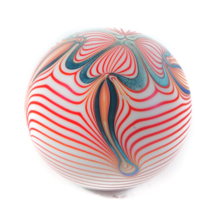 SIGNED LOETZ- STYLE IRIDIZED PAPERWEIGHT.: Late 20th century. Milk glass with four leaf clover and red threading. 2.5"h. 3"dia.