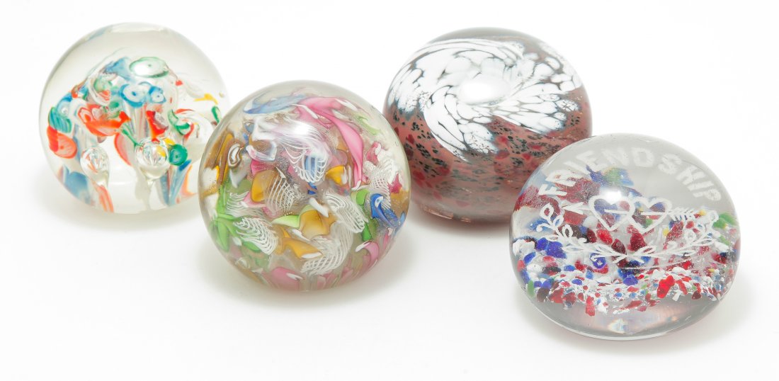 FOUR ART GLASS PAPERWEIGHTS.: Twentieth century. Signed and dated "Antony Steen 1979". Mottled brown and white with red and black speckles, 2.75"d., millefiori canes with "Venice" label on bottom, 2.5"d. and millefiori and lattici