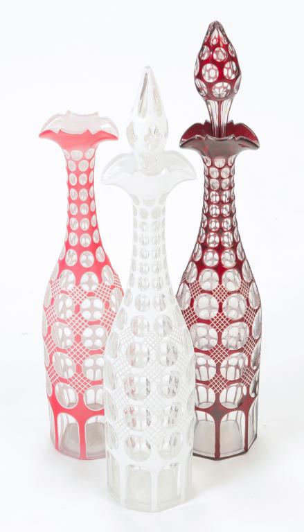 THREE AMERICAN CUT OVERLAY DECANTERS. (1 of 2)