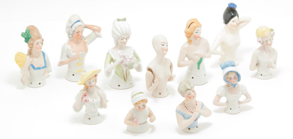 ELEVEN GERMAN PINCUSHION HALF DOLLS. (1 of 5)