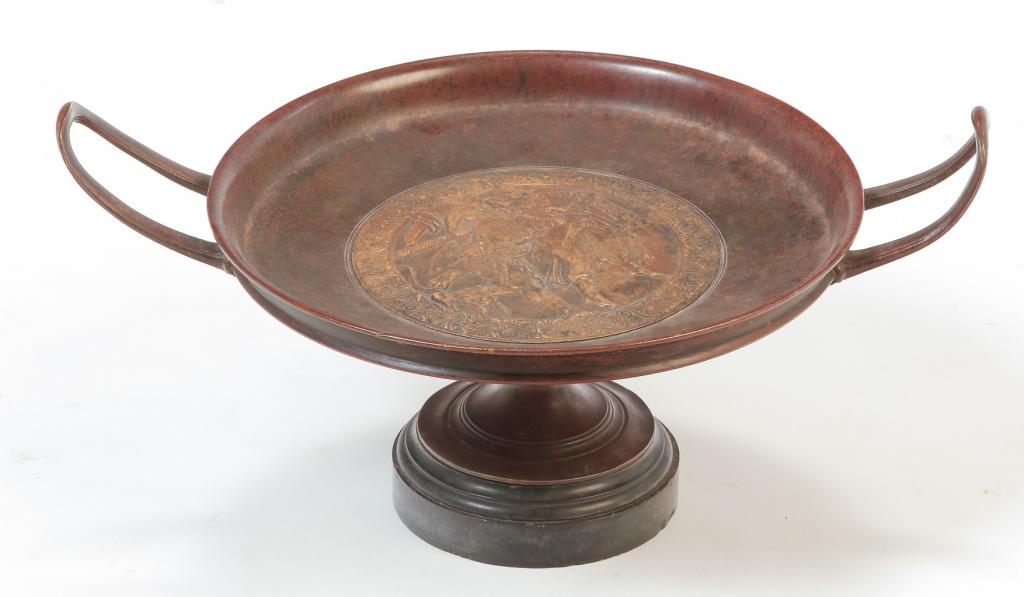 EUROPEAN BRONZE KYLIX.: Second half 19th century. Mottled reddish brown patinization with center scene of Hercules 9th task, Hippolyta's girdle. Slate base. 8.5"h. 12.25"d.