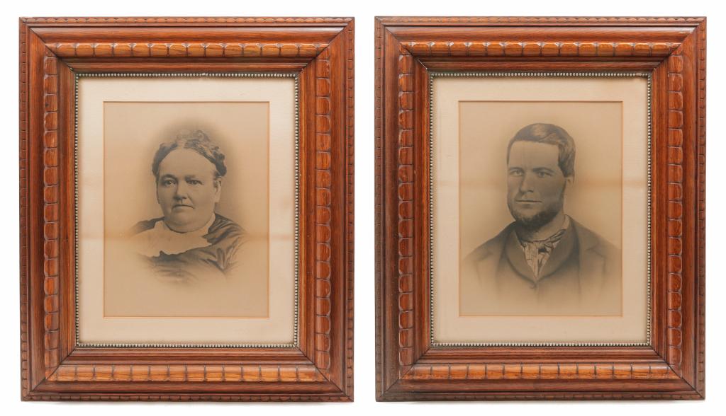 PAIR OF AMERICAN FRAMES.: Late 19th century, oak. Large carved frames with beaded liners. Old refinishing with some bead loss. House photos of man and woman. 20"h. 16"w. opening, 28.25"h. 24.25"w.