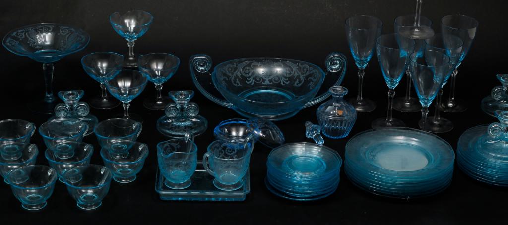 GROUP OF FOSTORIA STEMWARE AND SERVING PIECES.: Mid 20th century. Pale blue: including Blue Versailles Pattern. Includes wine glasses, sherbets, compote, 6.5"h. 7.5"d., plates, 8.75"d., cups and saucers and double handled dish.