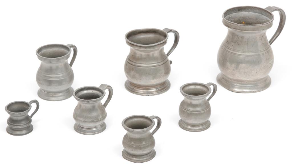 SEVEN ENGLISH PEWTER BELLIED MEASURES. (1 of 3)