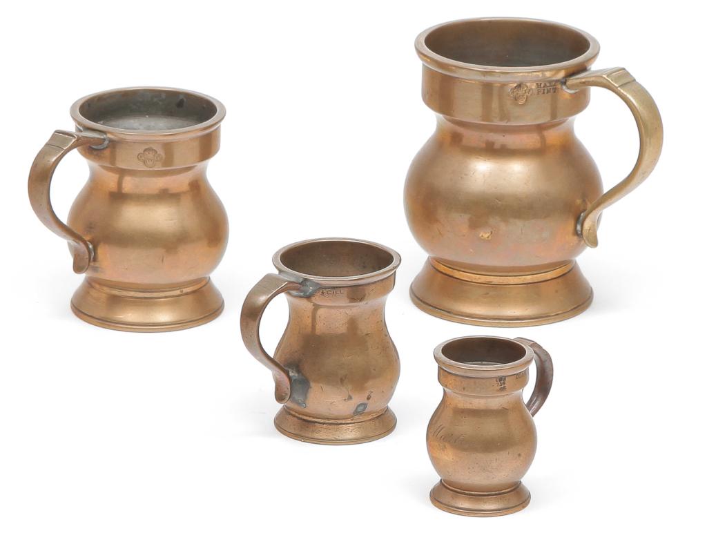 FOUR ENGLISH BRASS BELLIED MEASURES. (1 of 3)
