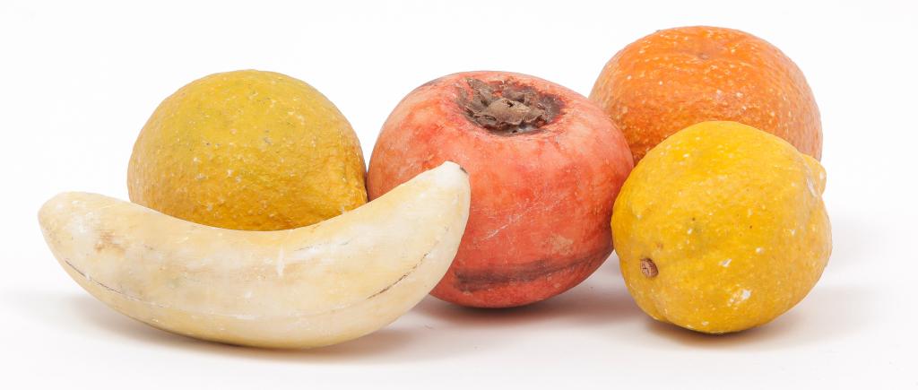 FIVE PIECES OF EUROPEAN STONE FRUIT.: Twentieth century. Two lemons, orange, banana and persimmon. Original paint. Wear and some repair.