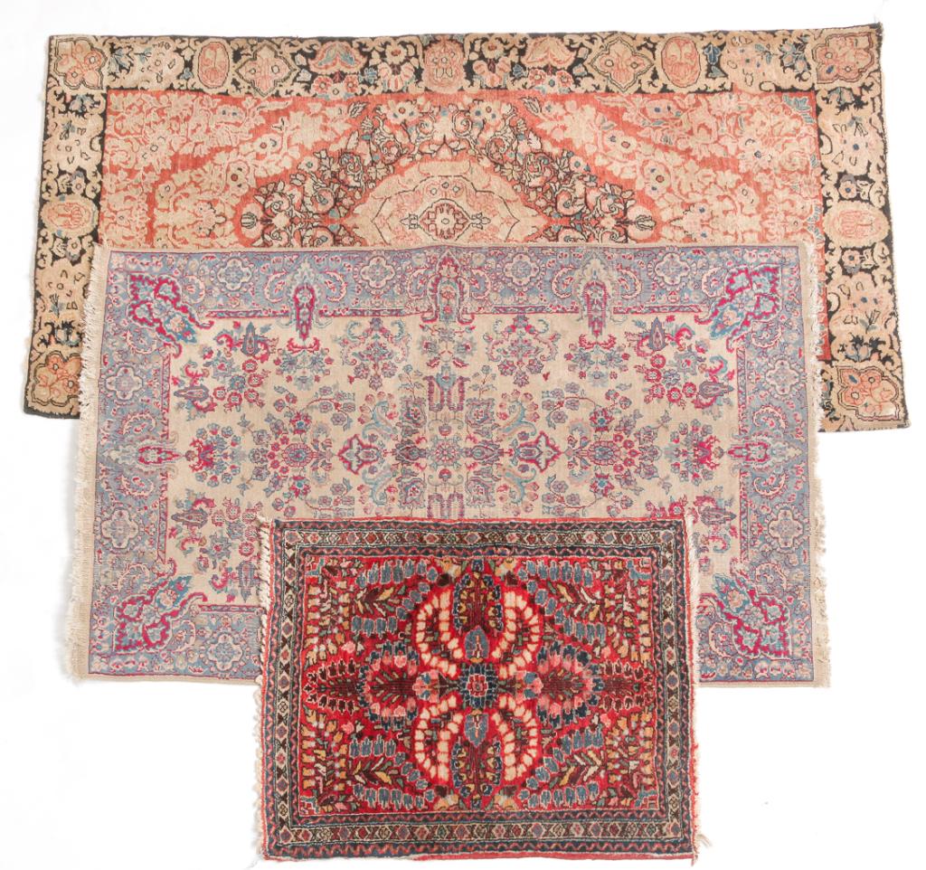 THREE ORIENTAL RUGS. (1 of 4)