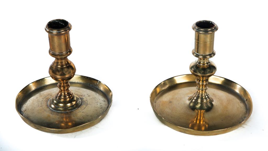 TWO BRASS CANDLESTICKS. (1 of 3)