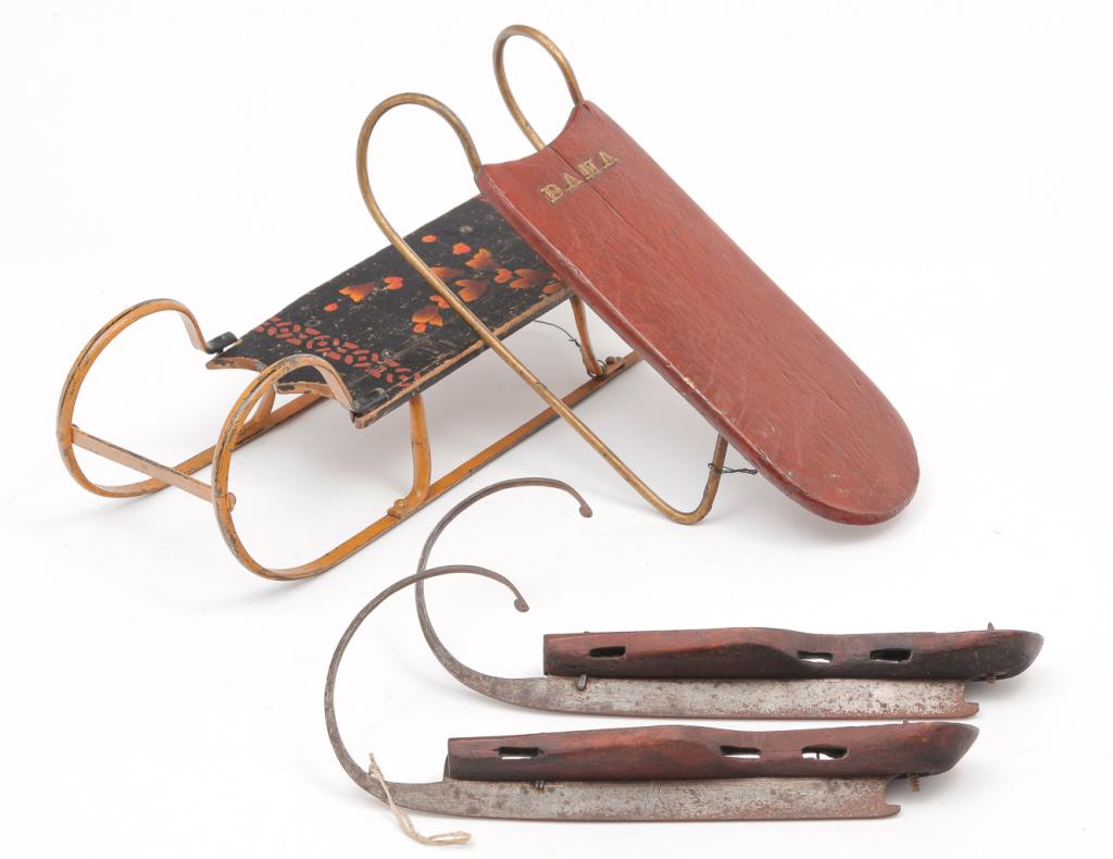 TWO AMERICAN DOLL SLEDS AND PAIR OF ICE SKATES. (1 of 6)