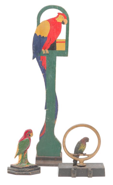 THREE AMERICAN PARROT DOORSTOPS. (1 of 3)
