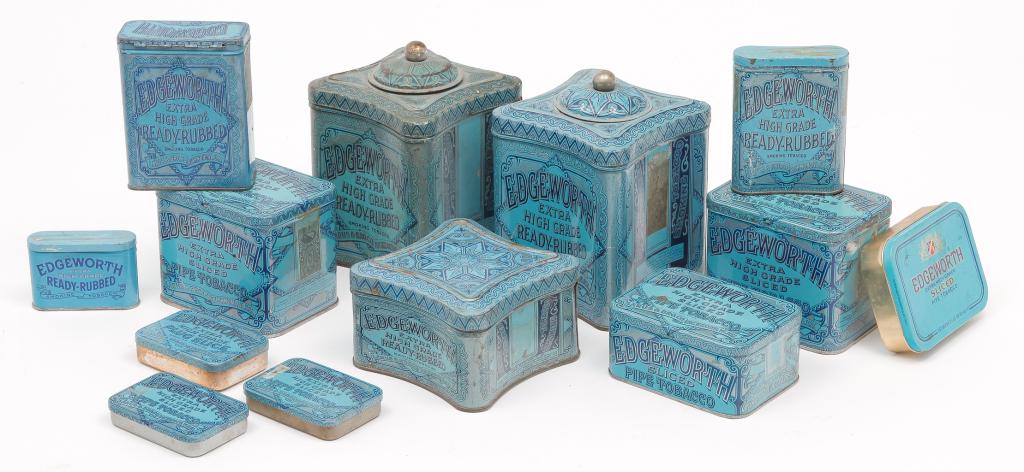 THIRTEEN AMERICAN "EDGEWORTH" TOBACCO TINS.: Twentieth century. Blue lithographs on tin in various shapes and sizes. Varying wear. .75" to 6.5"h. From the Collection of Maxine and Dave Tronnes, Mitchell, South Dakota.