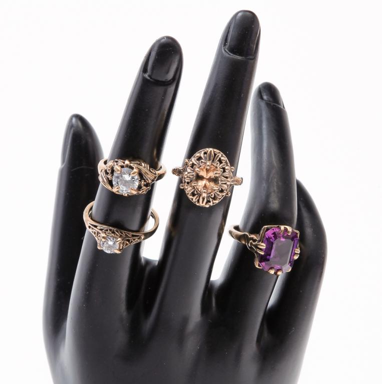 FOUR ANTIQUE STYLE GEM-SET GOLD RINGS. (1 of 2)