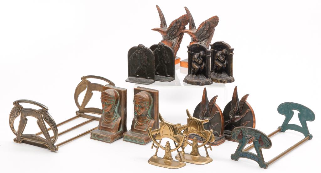SIX PAIRS OF AMERICAN BOOKENDS AND TWO RACKS. (1 of 8)